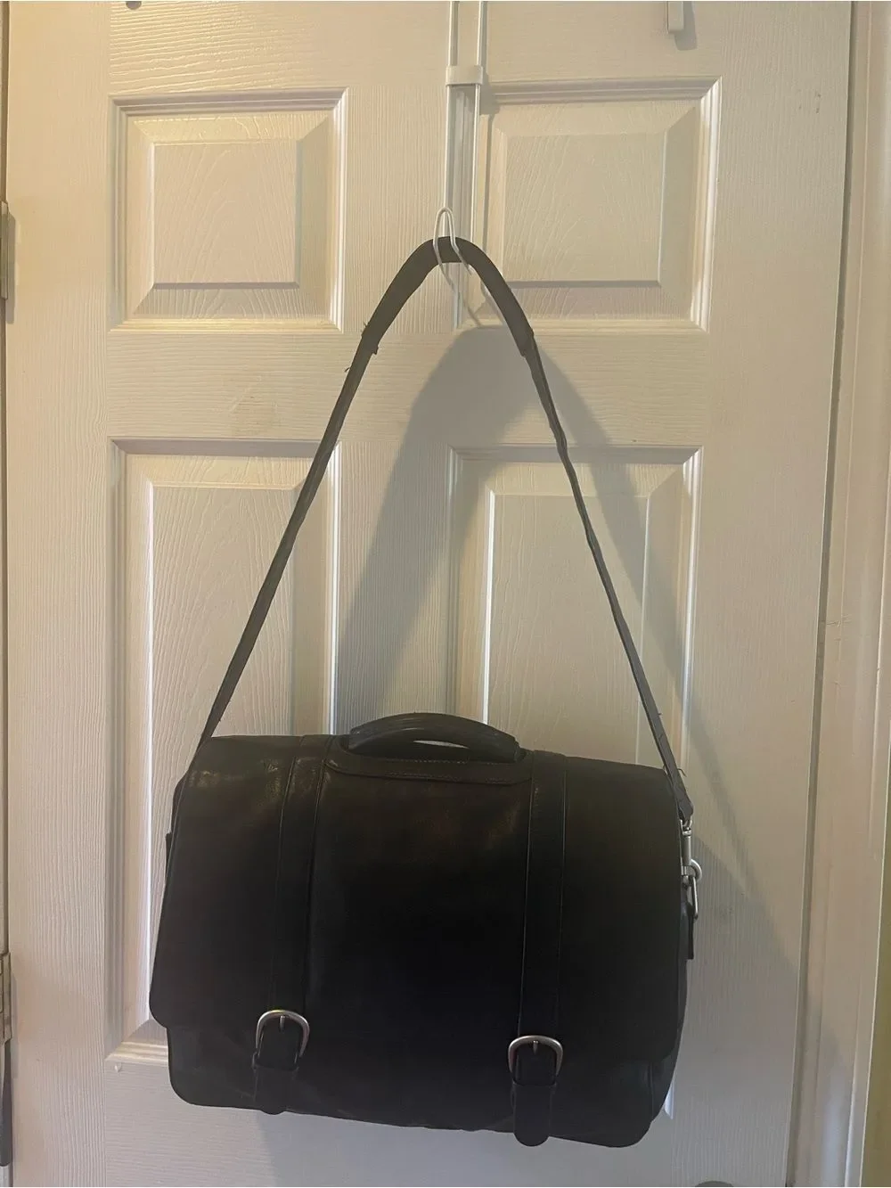 Kenneth Cole Black Leather large briefcase with padded shoulder strap .